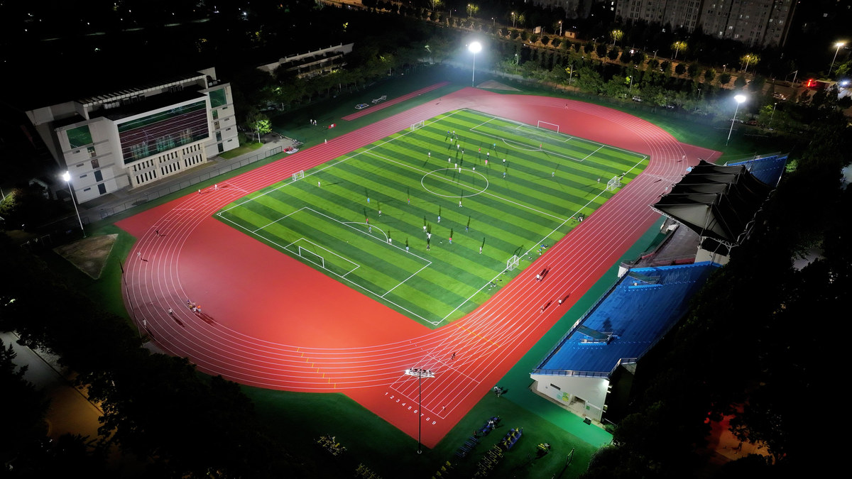 Xuzhou Medical University — athletics track at night